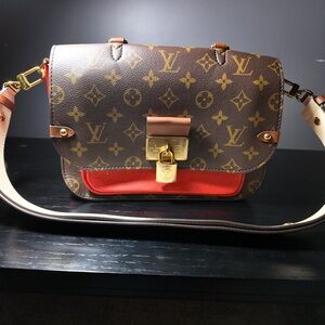 Louis Vuitton VAUGIRARD MNG COQUELICOT
M44548